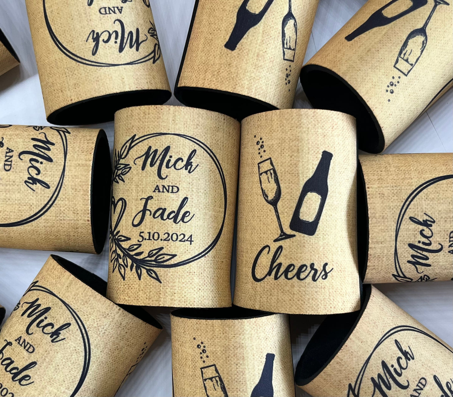 WS054 | Personalised “Cheers” Wedding Stubby Holders — Wreath Design with Bottle & Glass | Custom Name & Date | Can Cooler Favour