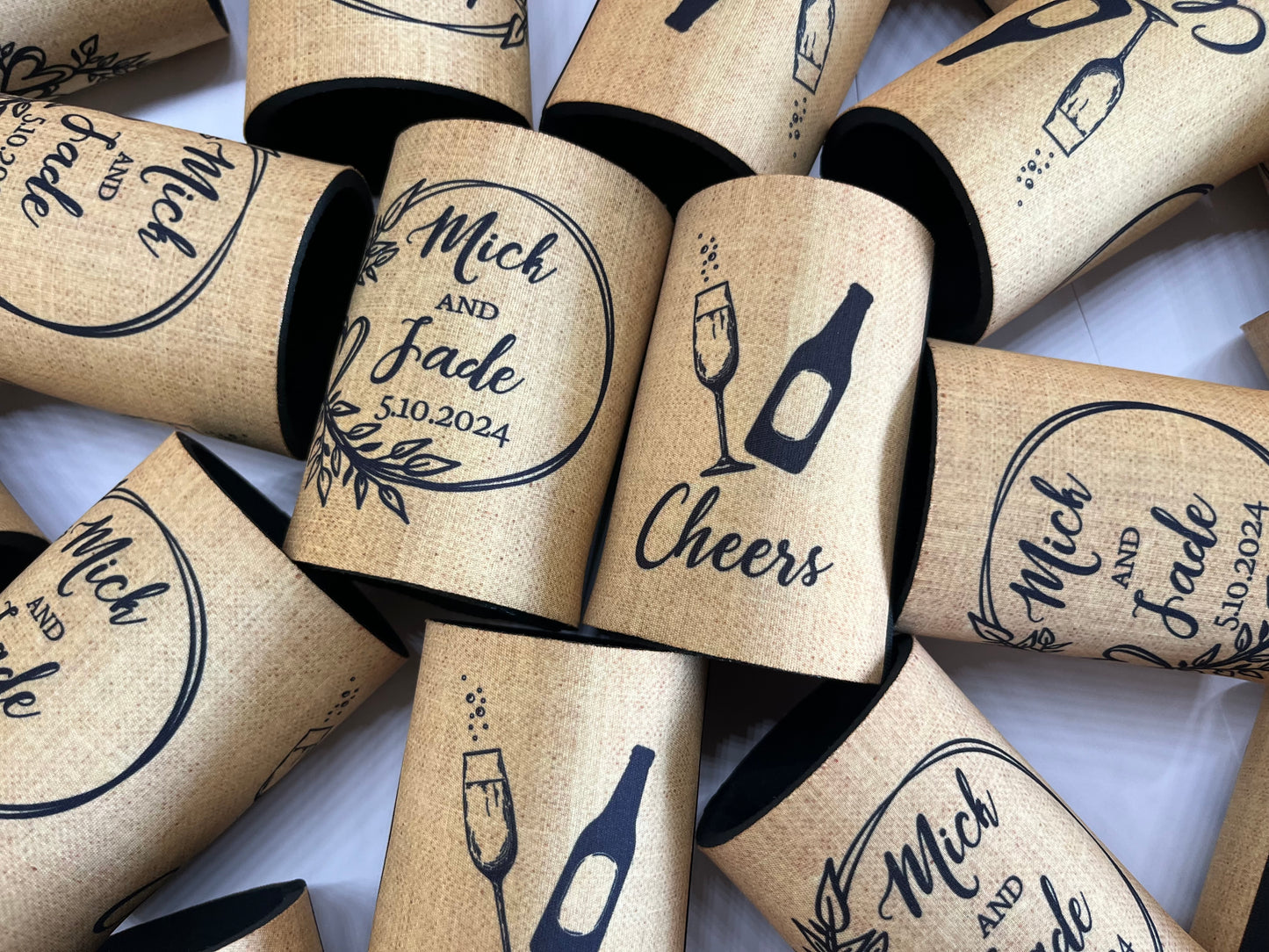 WS054 | Personalised “Cheers” Wedding Stubby Holders — Wreath Design with Bottle & Glass | Custom Name & Date | Can Cooler Favour