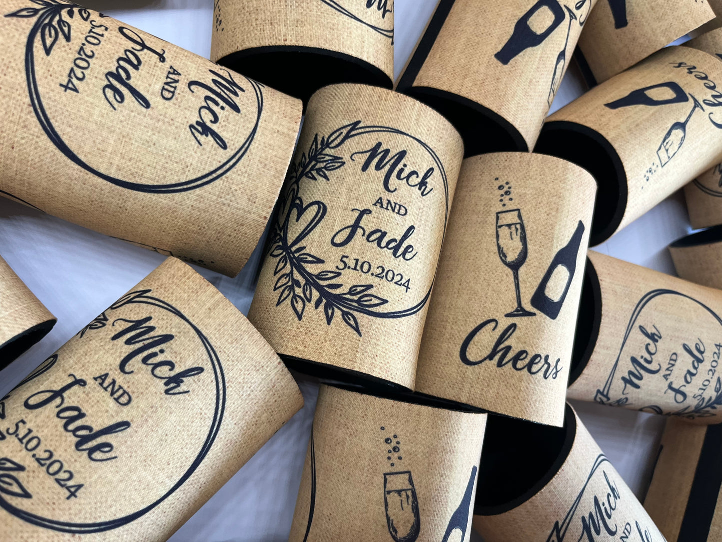 WS054 | Personalised “Cheers” Wedding Stubby Holders — Wreath Design with Bottle & Glass | Custom Name & Date | Can Cooler Favour